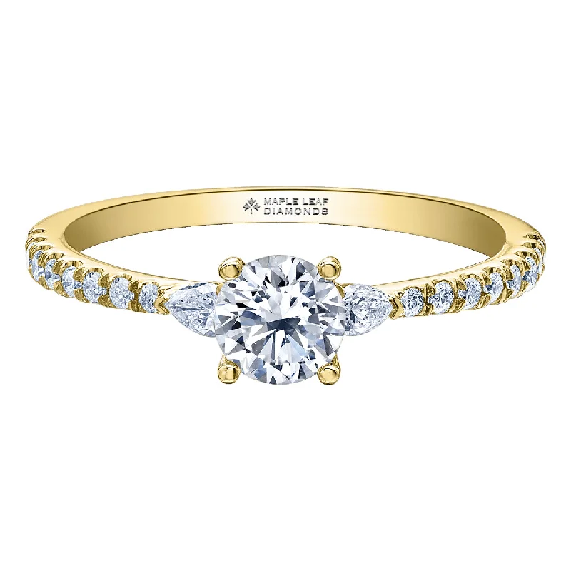 Round Diamond Ring With Pear-Shaped Diamond Shoulders